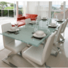 The image of a clear Glass Table in a dining room